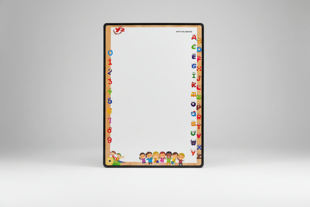 Writing board with colorful letters and numbers border on a dark background