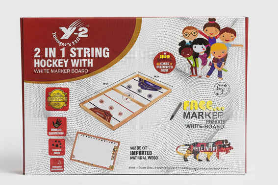 Box of Y2 2-in-1 String Hockey and Paint Set on a tiled floor